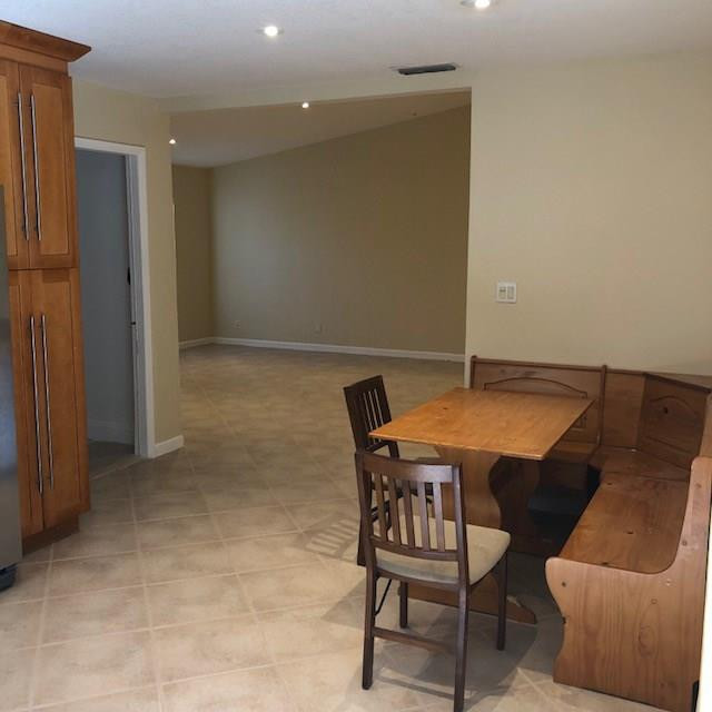 20942 Springs Terrace Boca Raton, FL 33428 - Photo 8 of 35 a view of a room with furniture and a table