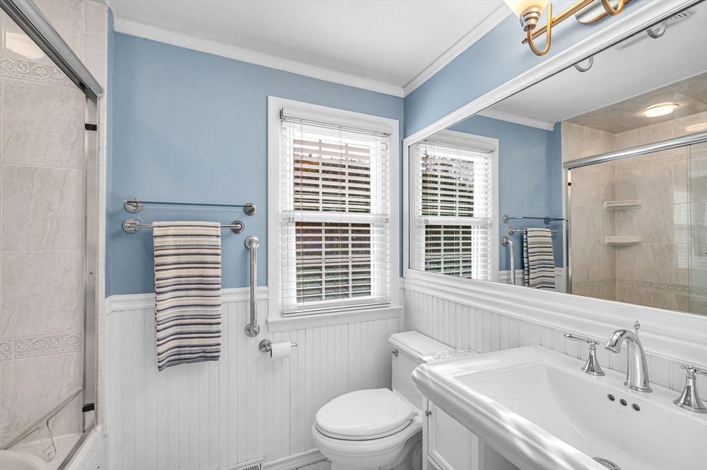 361 Frank Smith Road Longmeadow, MA 01106 - Photo 22 of 42 a bathroom with a sink a toilet and a window
