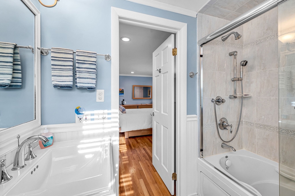 361 Frank Smith Road Longmeadow, MA 01106 - Photo 23 of 42 a bathroom with a tub sink and mirror