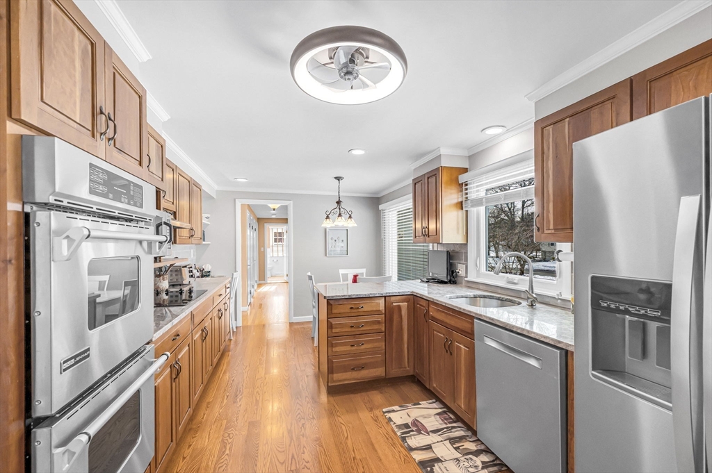 361 Frank Smith Road Longmeadow, MA 01106 - Photo 7 of 42 a kitchen with stainless steel appliances a refrigerator a stove a sink and dishwasher
