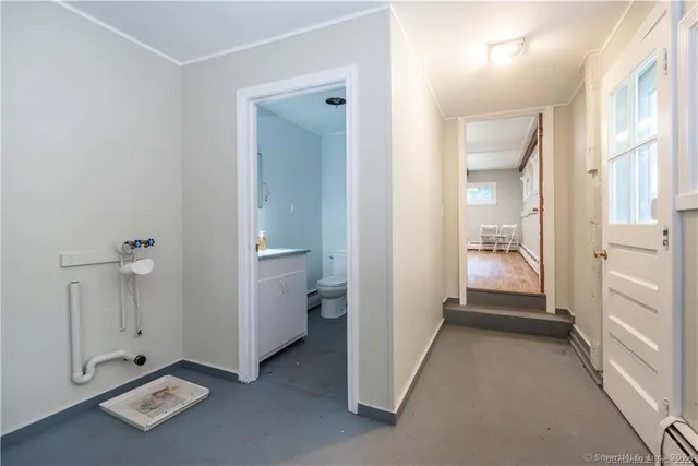 wooden floor with a wardrobe