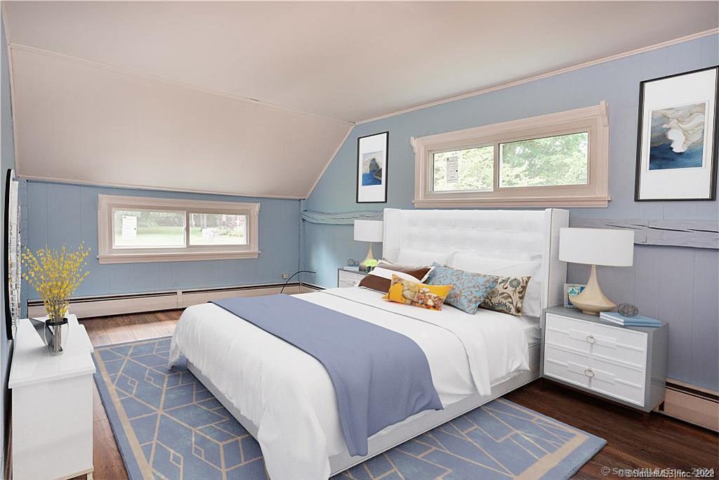 279 Fenn Road Cheshire, CT 06410 - Photo 4 of 28 a bedroom with a bed and wooden floor