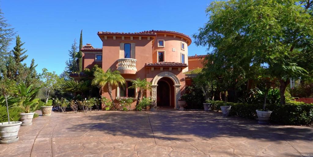 4633 Olive Hill Road Fallbrook, CA 92028 - Photo 3 of 10 a front view of a house with a yard