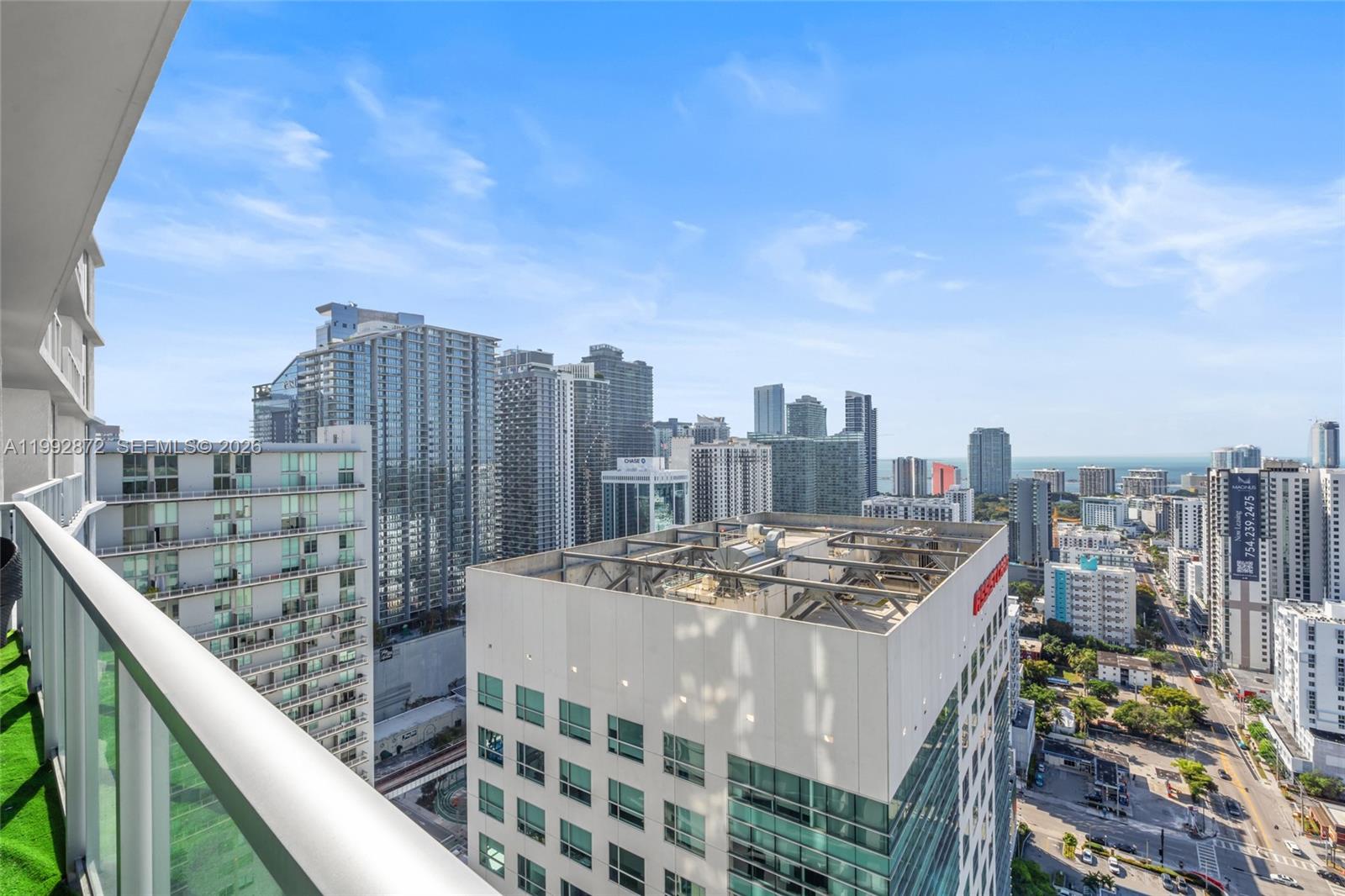 185 Southwest 7th Street, Unit 3414 Miami, FL 33130 - Photo 28 of 32 a view of a city with tall buildings