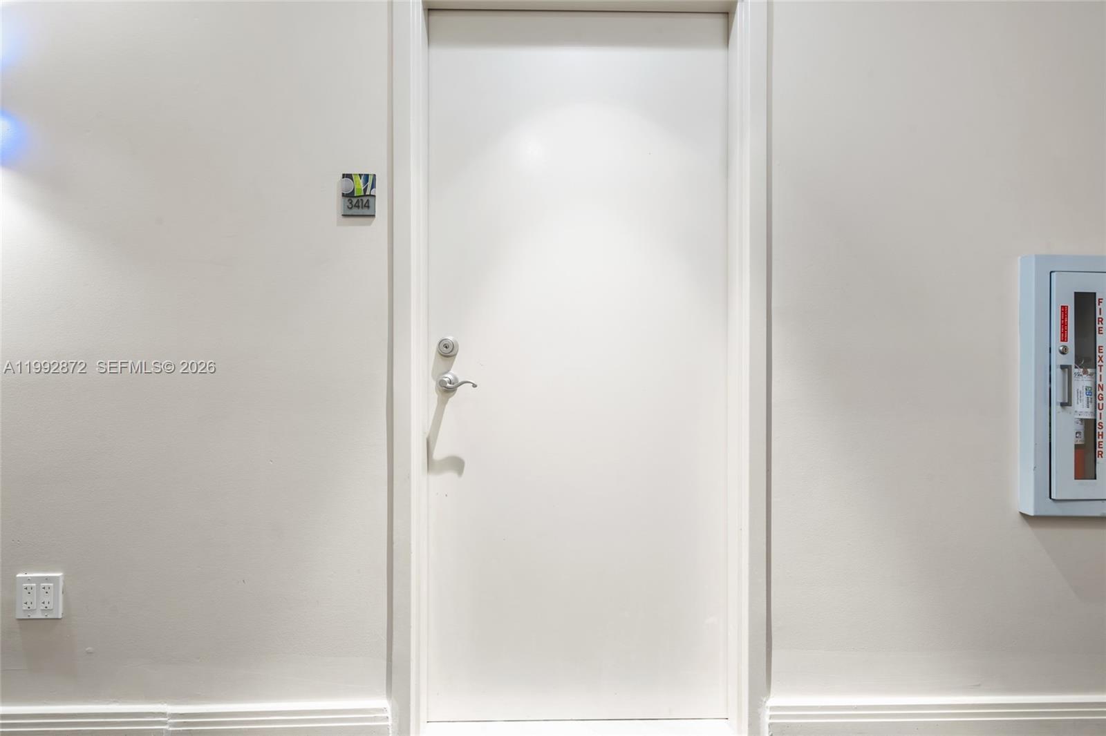 185 Southwest 7th Street, Unit 3414 Miami, FL 33130 - Photo 9 of 32 a bathroom with a glass shower door