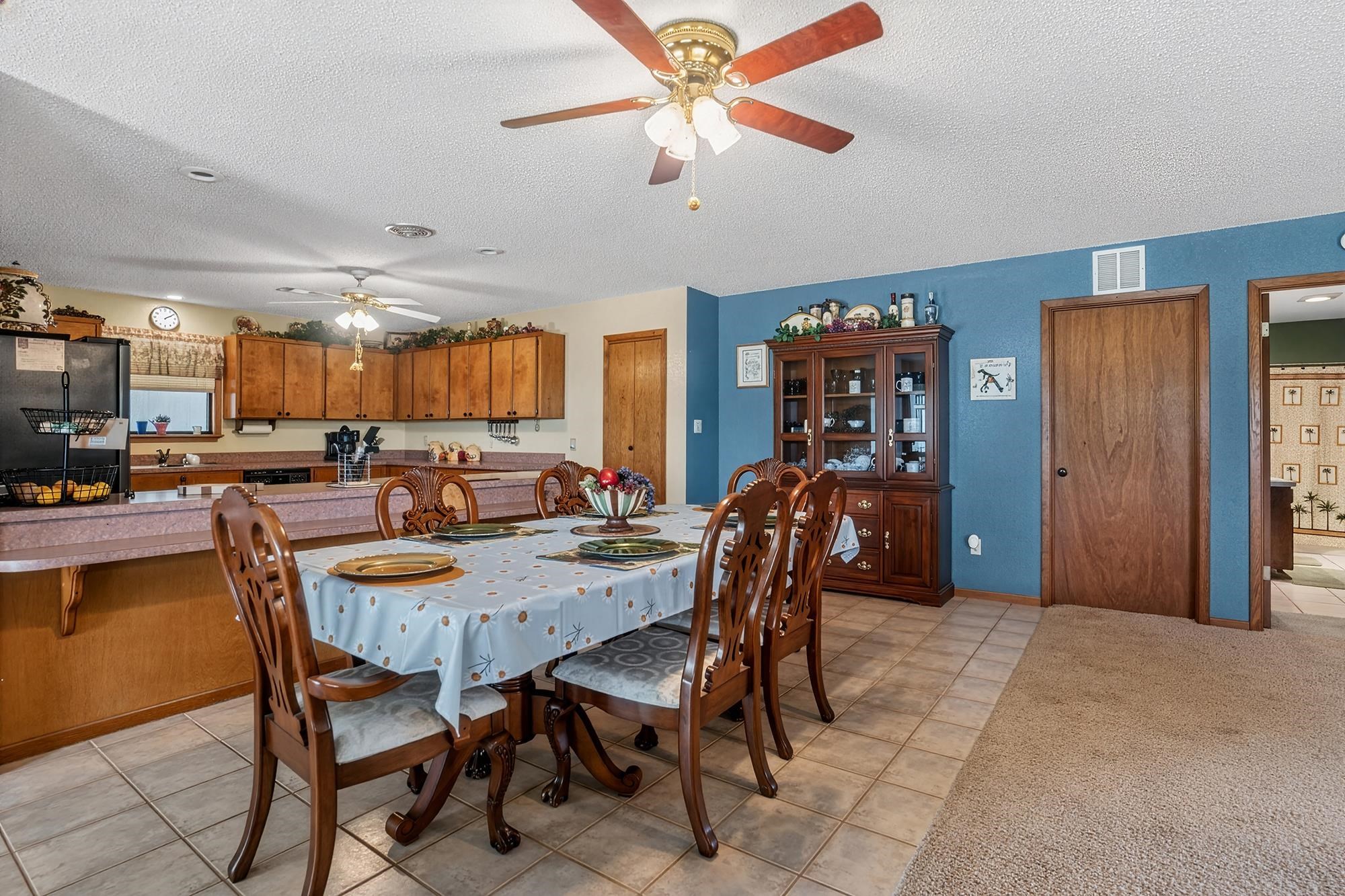 10465 Ranch To Market 1431 Buchanan Dam, TX 78609 - Photo 17 of 29 a view of a dining room with furniture