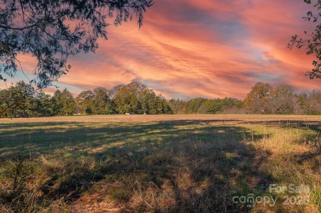 a view of mountain with lake view