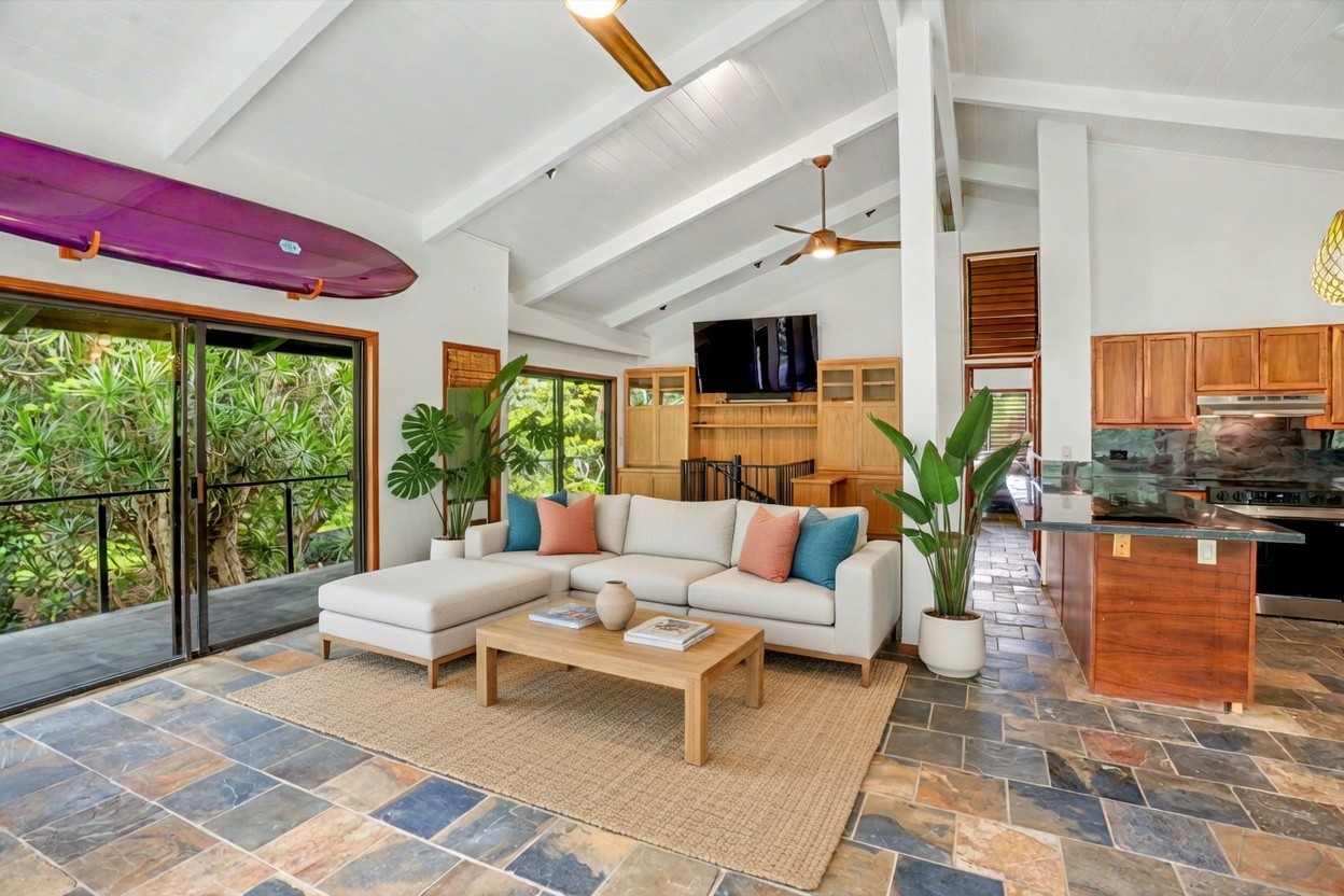 4470 A Wailapa Road Kilauea, HI 96754 - Photo 10 of 30 a living room with furniture and a large window