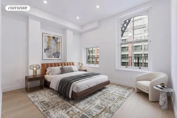 a dining room with kitchen island stainless steel appliances furniture stove and large window