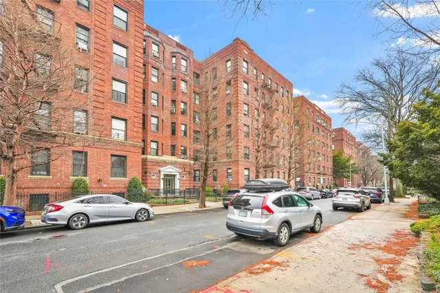 a cars parked in front of a building