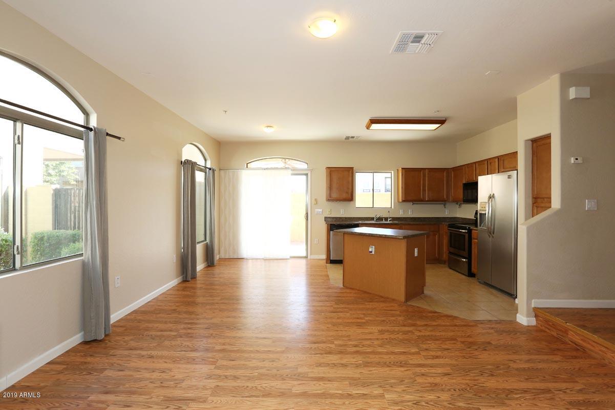 2150 East Bell Road, Unit 1111 Phoenix, AZ 85022 - Photo 3 of 33 Great Room-Kitchen