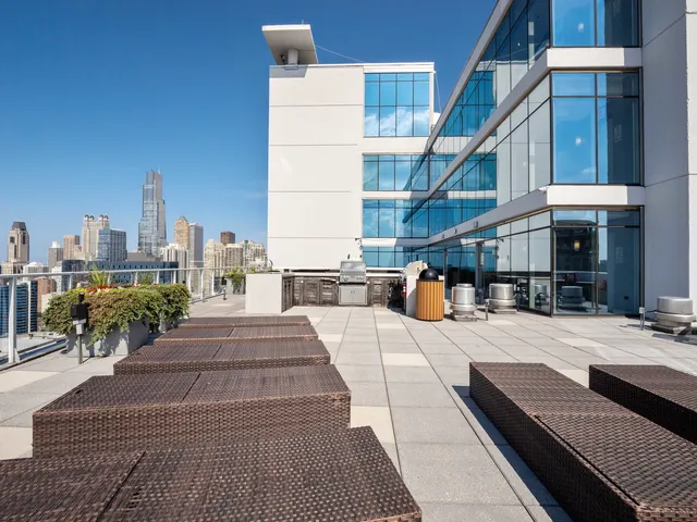 a view of roof with sitting area