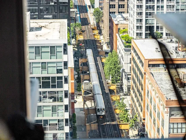 a balcony with furniture and wooden floor