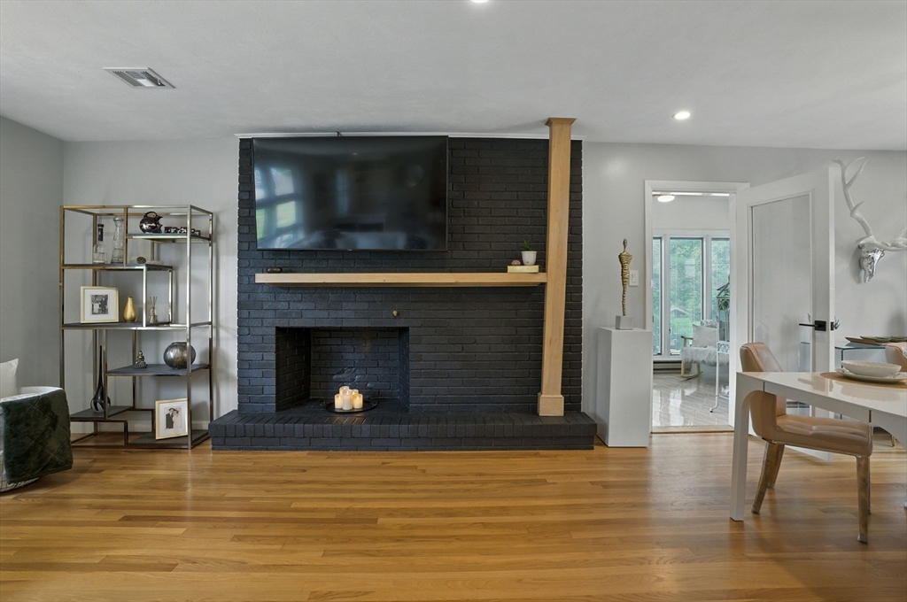 30 Linda Road Andover, MA 01810 - Photo 19 of 42 a living room with furniture and a fireplace