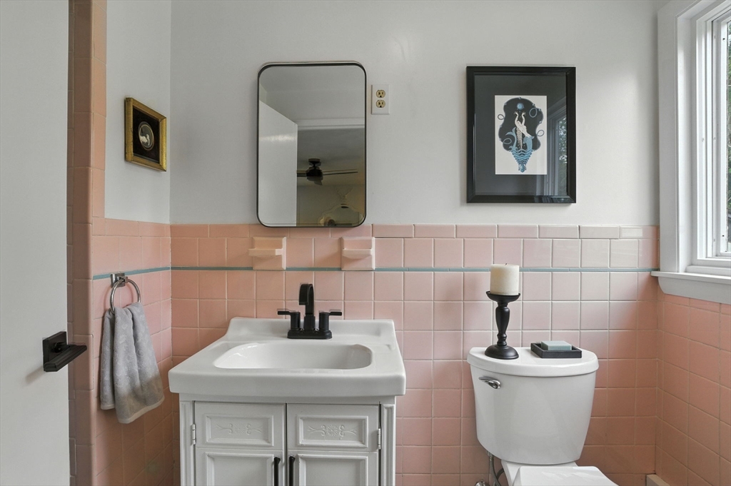 30 Linda Road Andover, MA 01810 - Photo 26 of 42 a bathroom with a toilet a sink and mirror