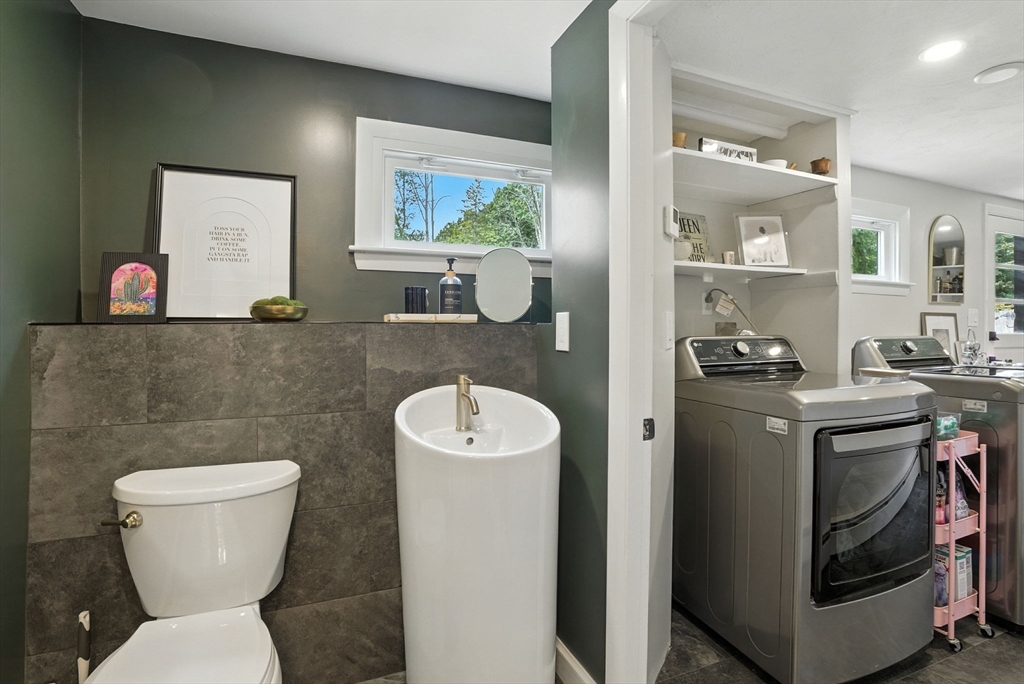 30 Linda Road Andover, MA 01810 - Photo 30 of 42 a bathroom with a toilet sink and mirror