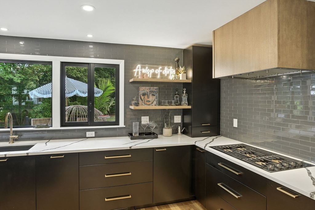 30 Linda Road Andover, MA 01810 - Photo 6 of 42 a kitchen with a sink and a stove