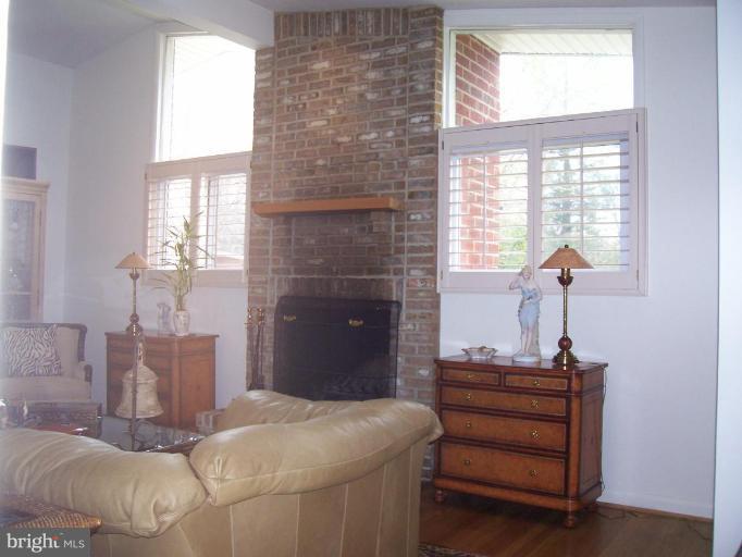 912 Hyde Road Silver Spring, MD 20902 - Photo 9 of 18 Vaulted ceiling, recessed lights, fireplace, hdwd