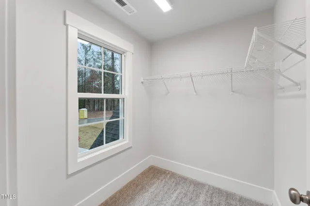 a view of a room that has a window in it