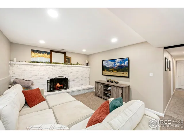 a view of an empty room with windows