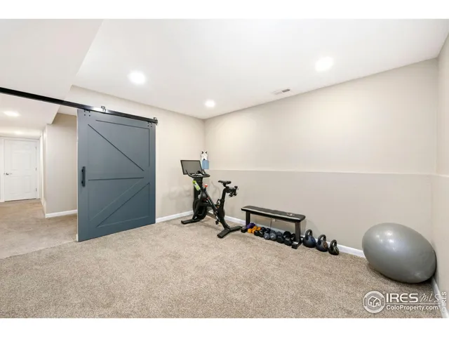 a view of a kitchen with furniture and a window