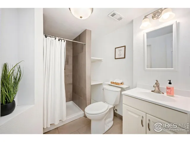 a room with furniture and a window