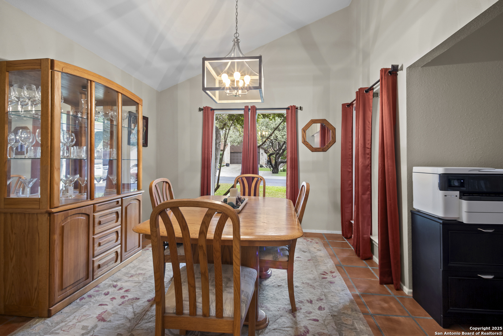 12907 Kings Forest Street San Antonio, TX 78230 - Photo 17 of 44 a view of a dining room with furniture window and wooden floor