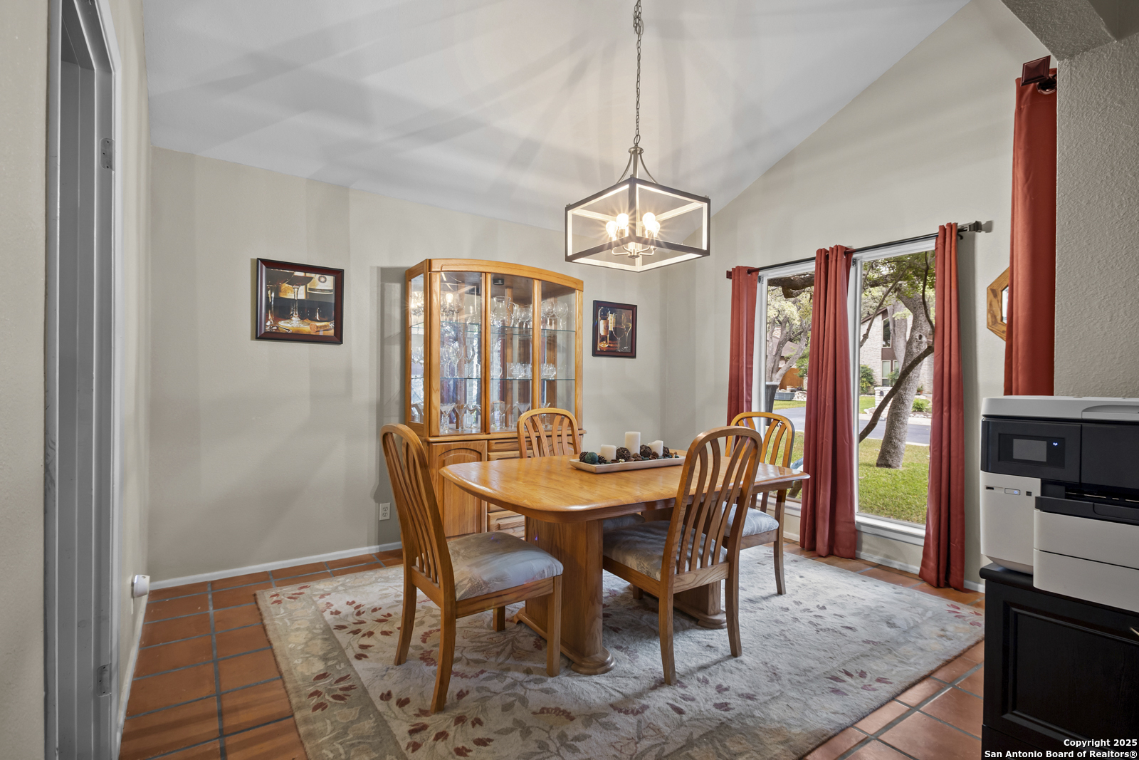 12907 Kings Forest Street San Antonio, TX 78230 - Photo 19 of 44 a view of a dining room with furniture window and wooden floor