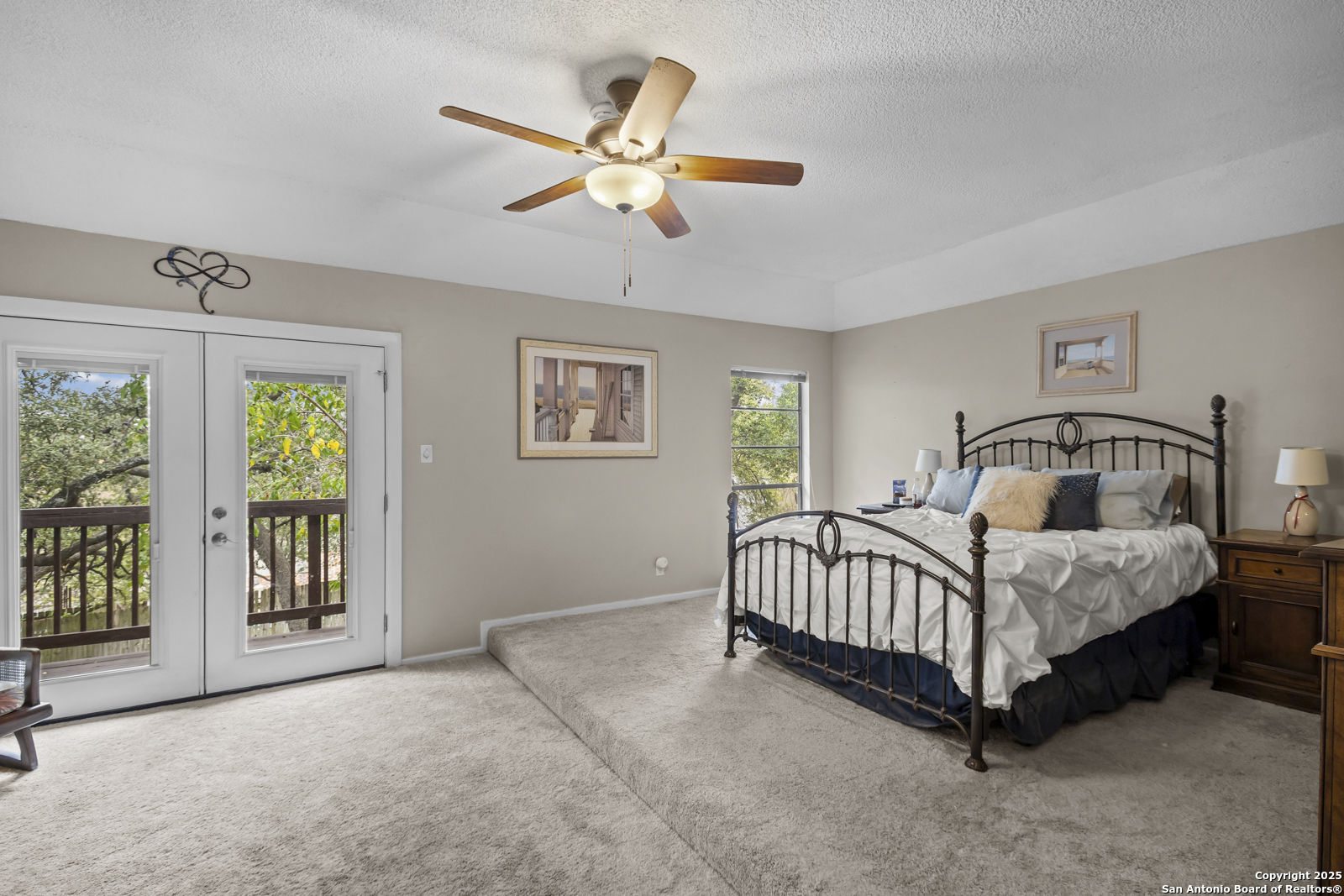 12907 Kings Forest Street San Antonio, TX 78230 - Photo 20 of 44 a bedroom with a bed and window