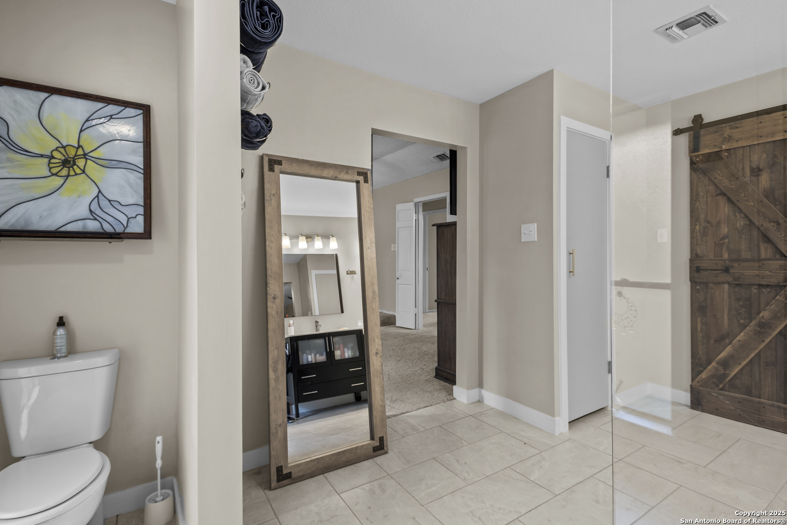 12907 Kings Forest Street San Antonio, TX 78230 - Photo 24 of 44 a bathroom with a toilet sink and tub