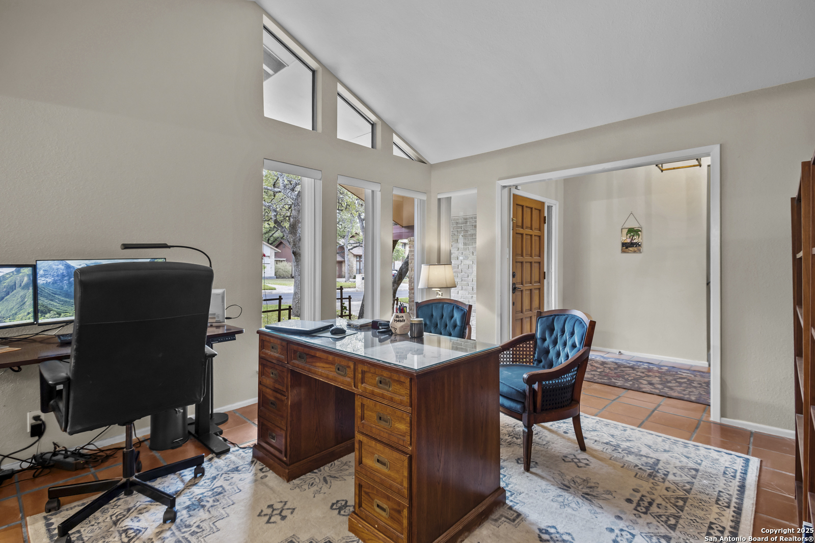 12907 Kings Forest Street San Antonio, TX 78230 - Photo 27 of 44 a view of a workspace with furniture and a window