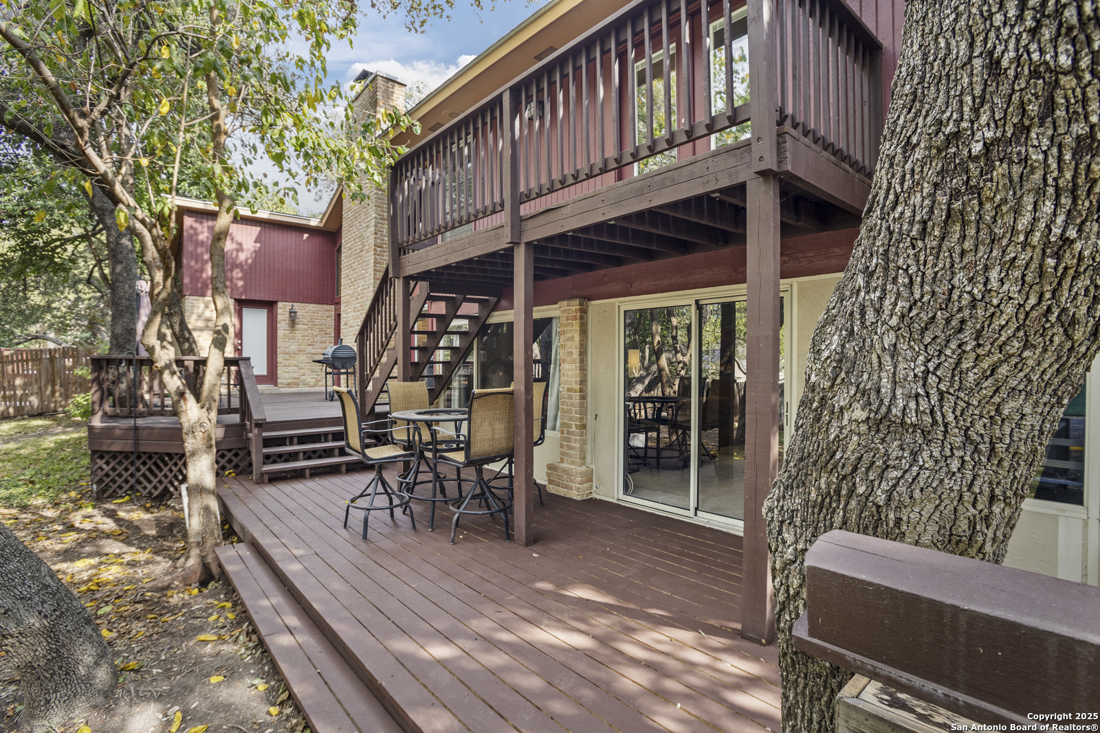 12907 Kings Forest Street San Antonio, TX 78230 - Photo 40 of 44 a view of a chairs and table in the patio
