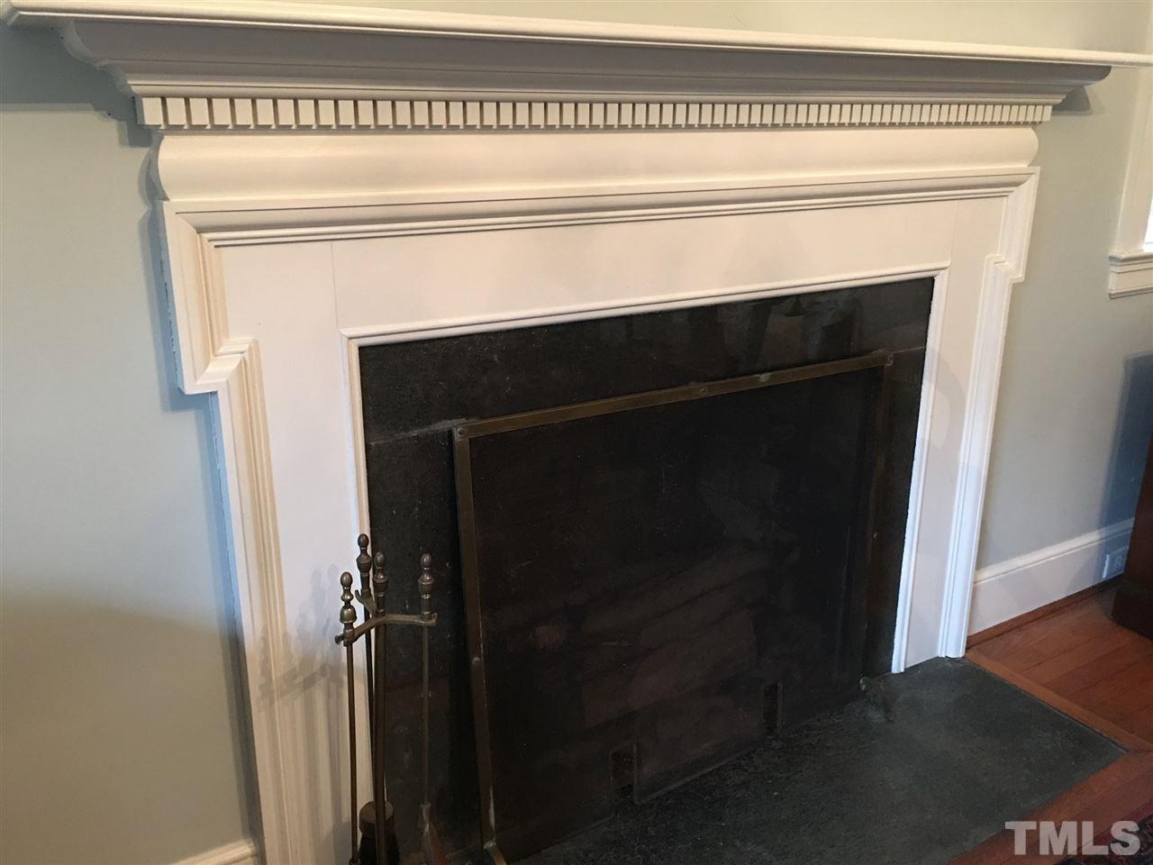 7 Sylvan Road Durham, NC 27701 - Photo 3 of 25 a close view of a fireplace