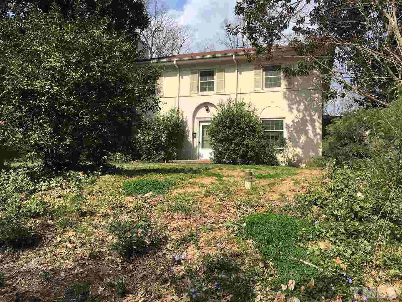 7 Sylvan Road Durham, NC 27701 - Photo 21 of 25 a front view of a house with garden