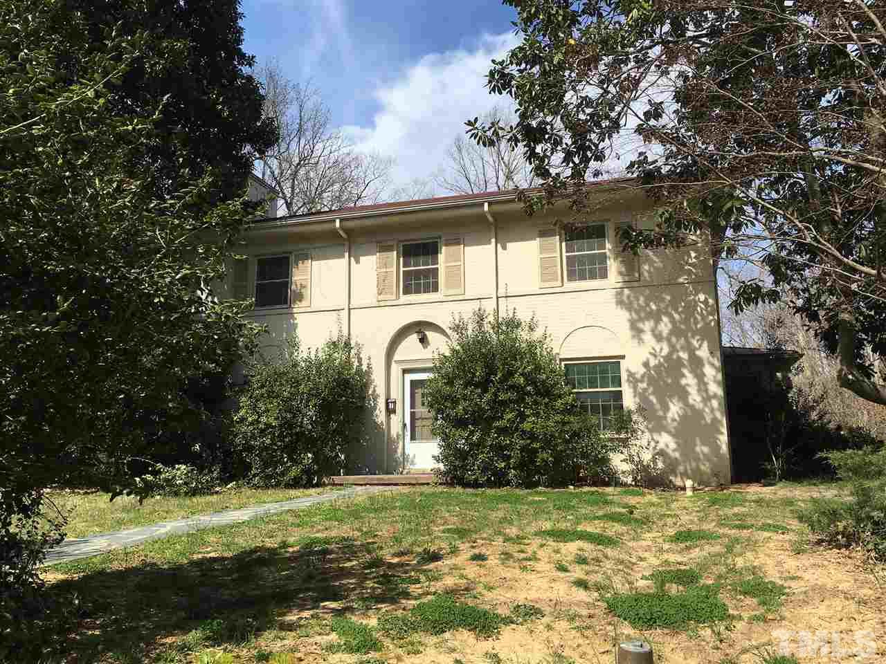 7 Sylvan Road Durham, NC 27701 - Photo 24 of 25 a front view of a house with a yard