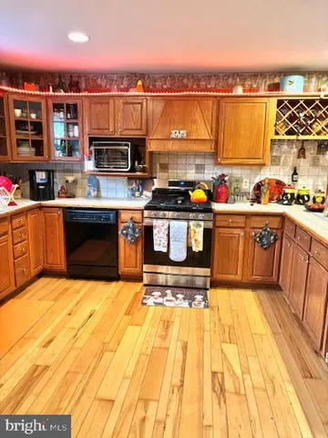 a view of a swimming pool with furniture