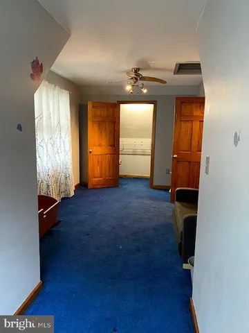 a bathroom with a tub and a shower