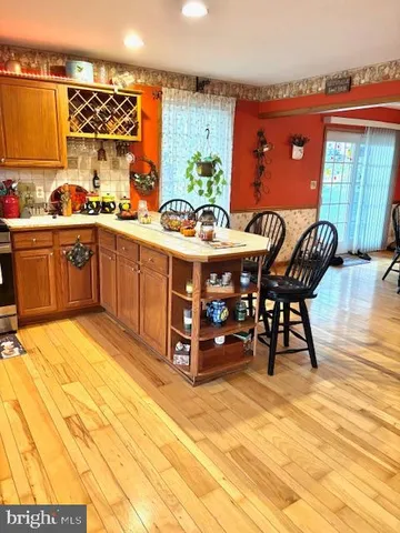 a view of a chairs and table in a patio