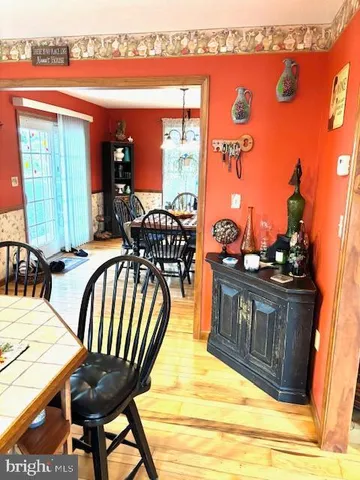 a view of swimming pool with outdoor seating