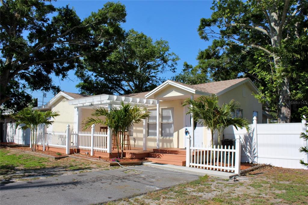 11862 125th Street Largo, FL 33774 - Photo 1 of 1 a front view of a house with a porch