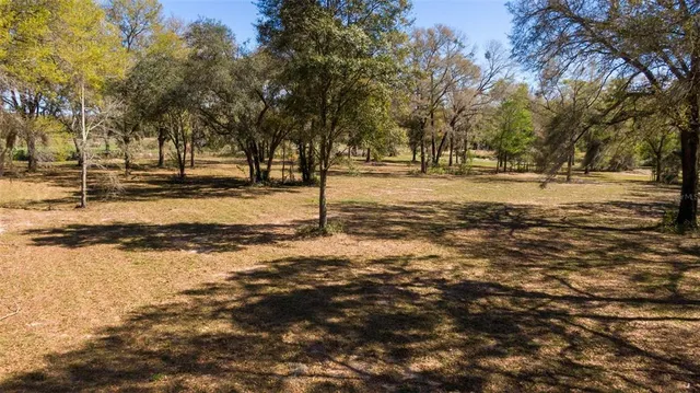 a view of yard covered with snow