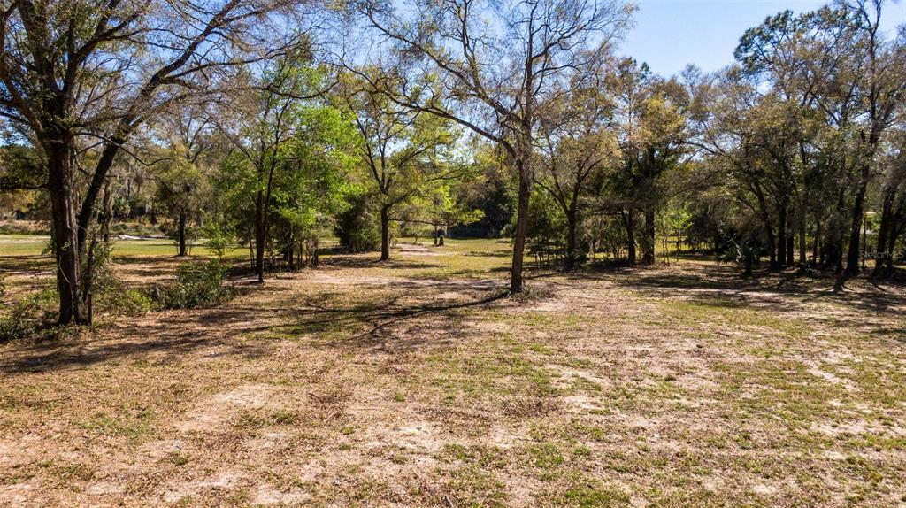 0 Northeast 36th Avenue Ocala, FL 34479 - Photo 19 of 35 a view of outdoor space with playground and trees