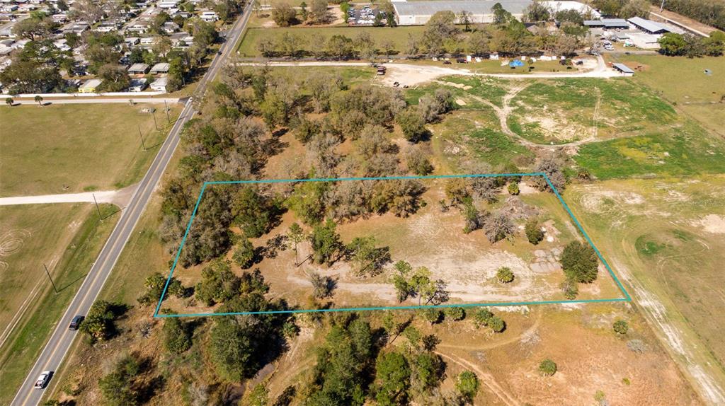 0 Northeast 36th Avenue Ocala, FL 34479 - Photo 34 of 35 an aerial view of residential houses with outdoor space