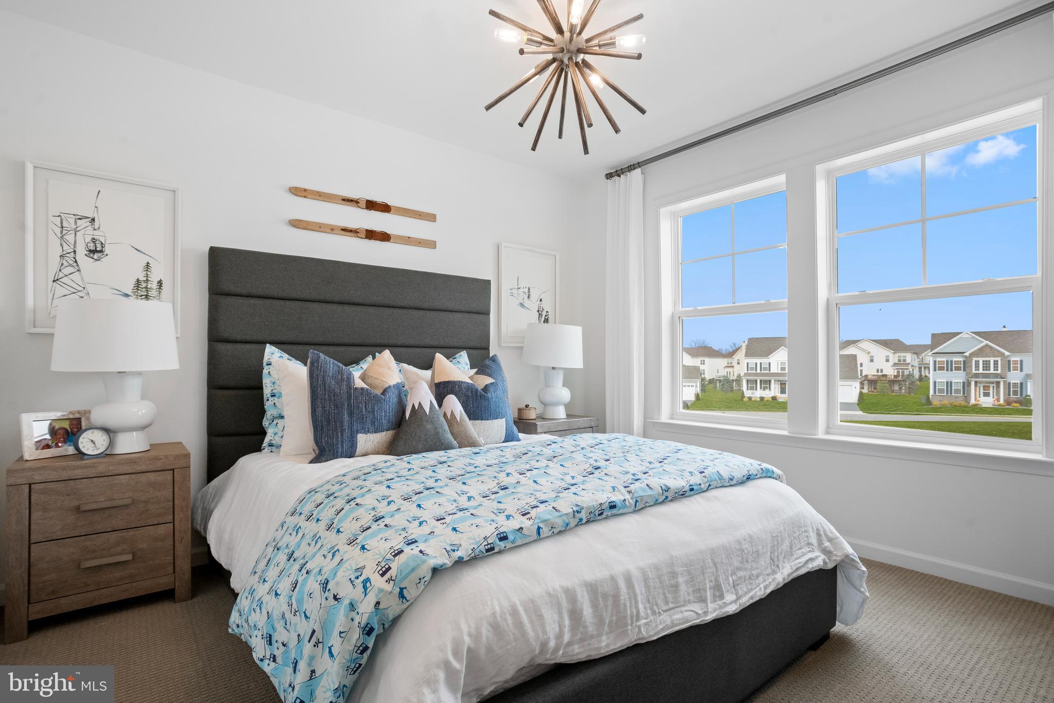 665 Stuart Street Charles Town, WV 25414 - Photo 13 of 27 a bed sitting in a bedroom next to a window