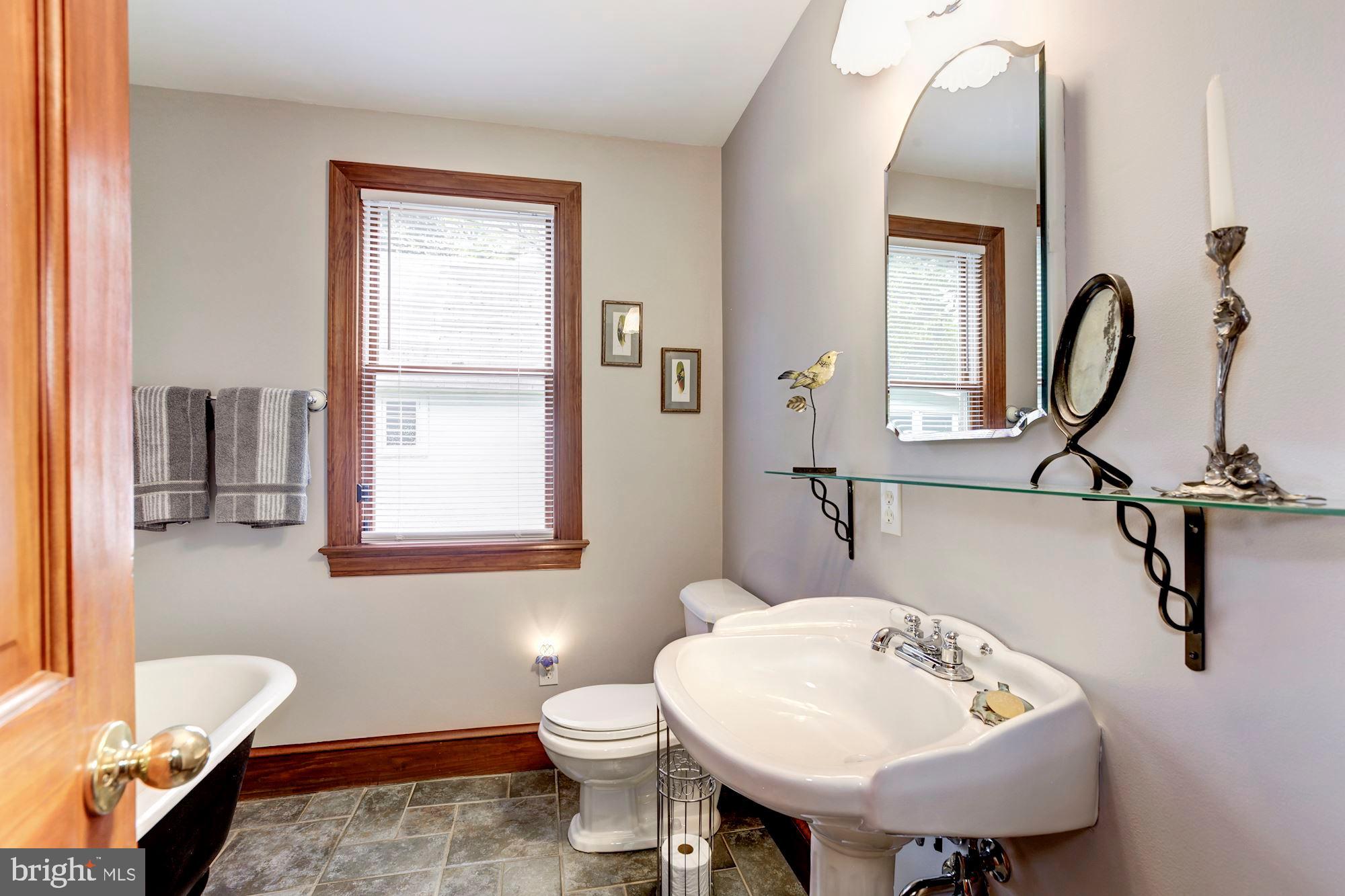 409 5th Avenue Washington Grove, MD 20880 - Photo 21 of 49 Main level hall bath with original claw foot tub