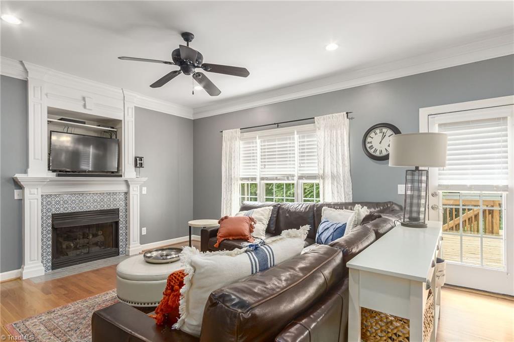 7611 Kristen Drive Oak Ridge, NC 27310 - Photo 8 of 25 Great room with gas logs fireplace