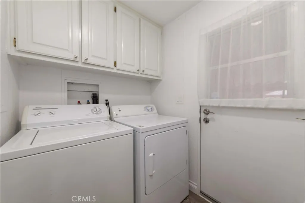 1051 Site, Unit 231 Brea, CA 92821 - Photo 14 of 34 a utility room with dryer and washer