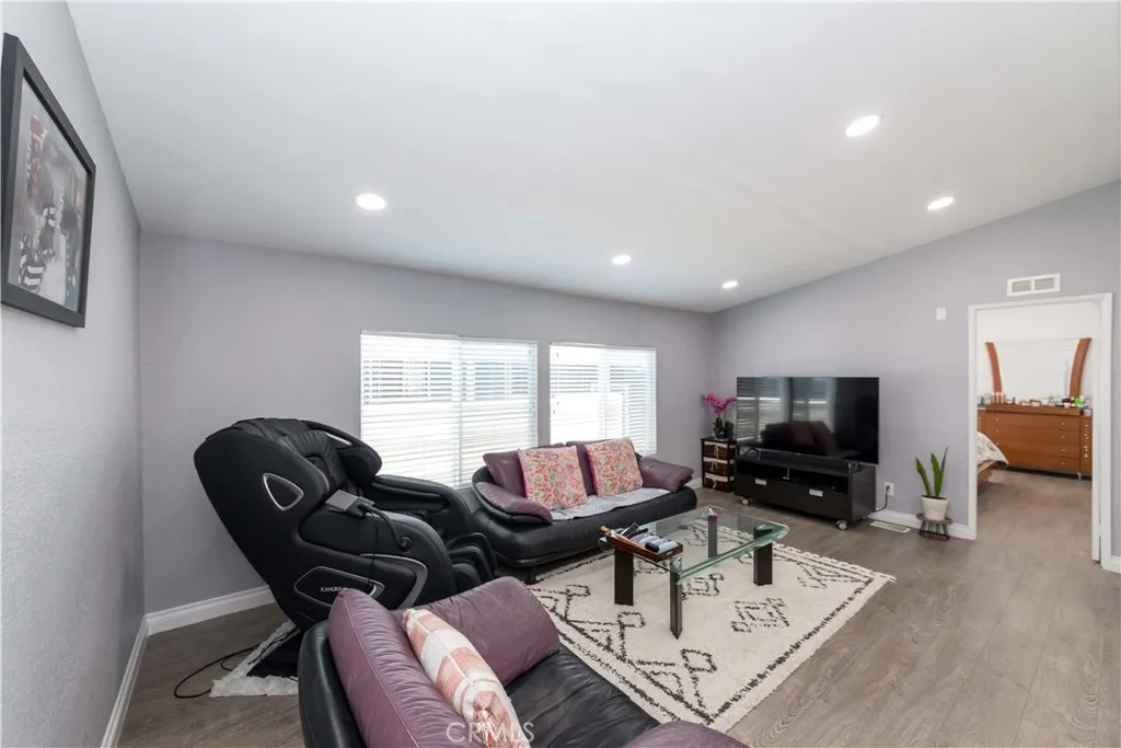1051 Site, Unit 231 Brea, CA 92821 - Photo 17 of 34 a living room with furniture and a flat screen tv