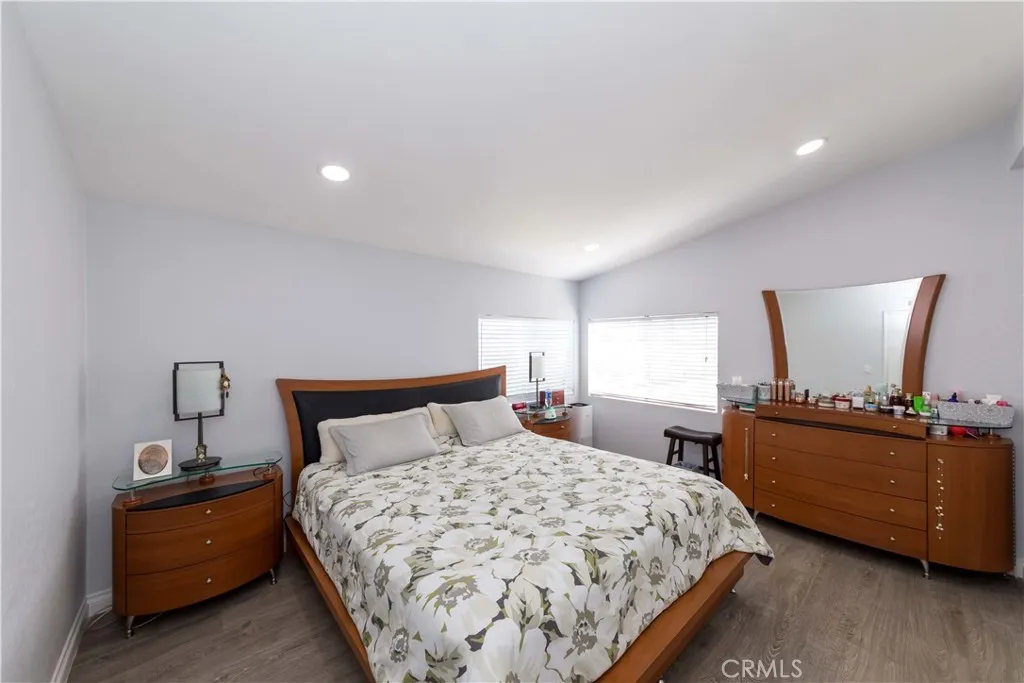 1051 Site, Unit 231 Brea, CA 92821 - Photo 18 of 34 a bedroom with a bed and dresser