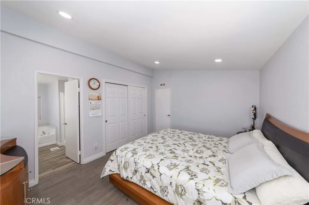 1051 Site, Unit 231 Brea, CA 92821 - Photo 20 of 34 a bedroom with a bed and a view of bedroom